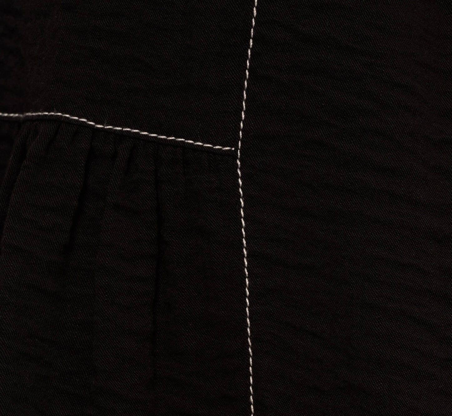 Extended Shoulder Contrast Stitch Yoke Top In Black Ivory