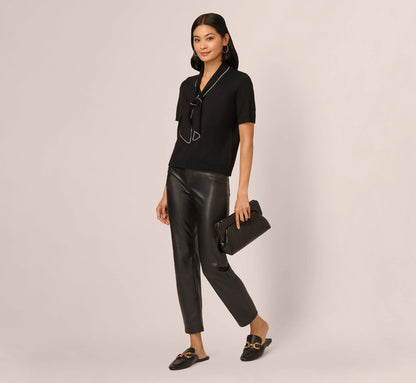 Short Sleeve Pearly Tie Neck Knit Top In Black