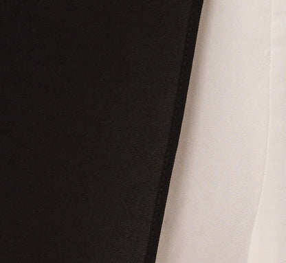 Colorblock Jumpsuit With Skirt Overlay In Black Ivory