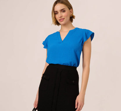 Flutter Sleeve Top With Notched Neck In Egyptian Blue