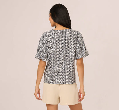 Bubble Sleeve Printed Tie Waist Top In Navy Stencil