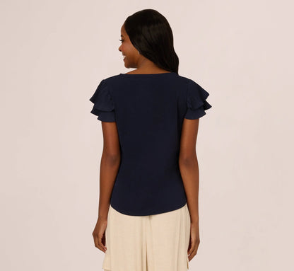 Double Flutter Sleeve Top With Pleated Details In Blue Moon