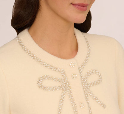 Pearly Bow Cardigan Sweater In Cream