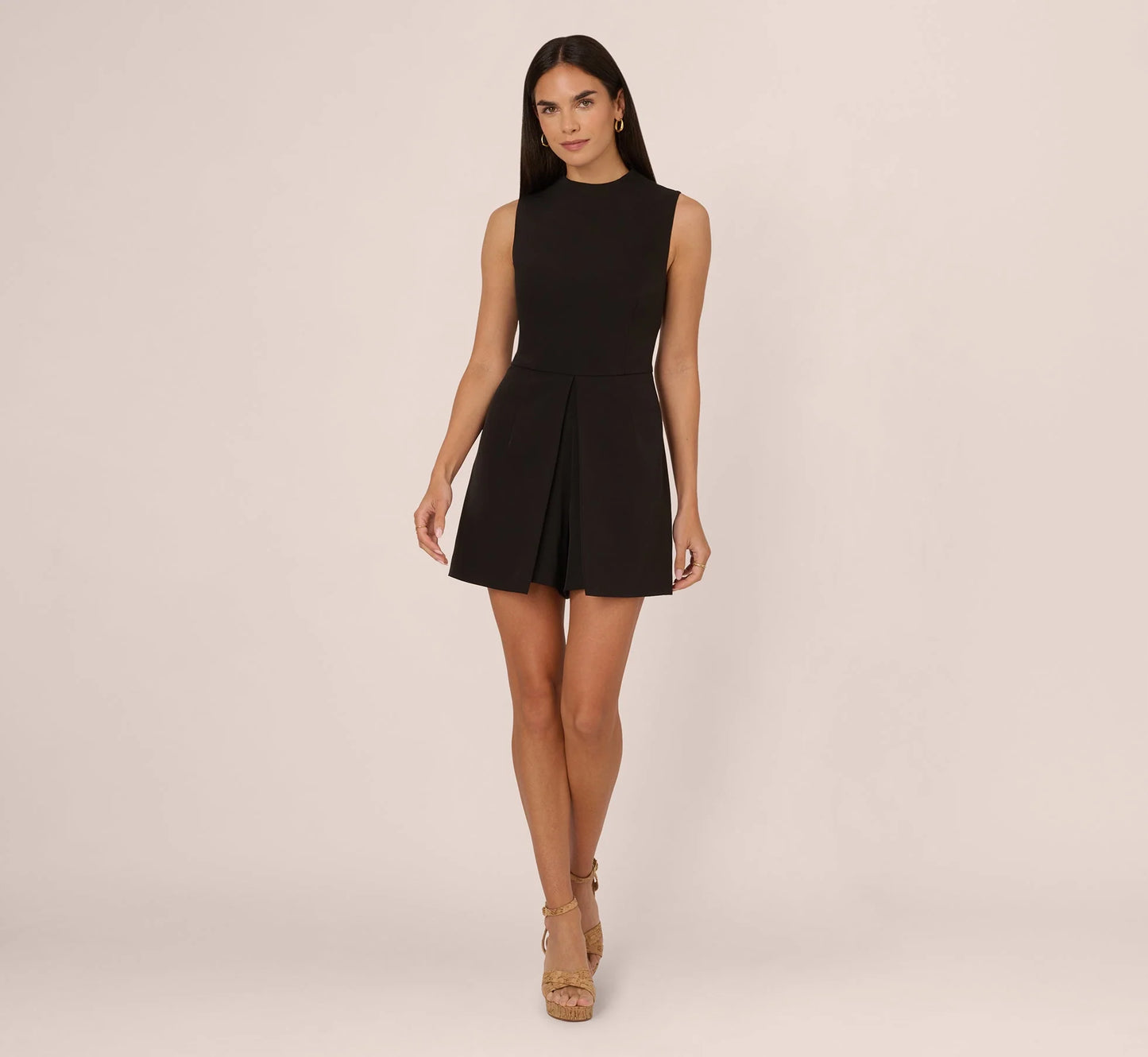 Sleeveless Romper With Peplum Hem In Black