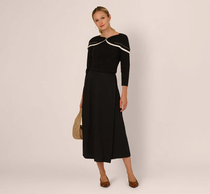 Off Shoulder Bow Collar Sweater In Black Ivory