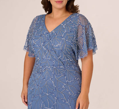 Plus Size Flutter Sleeve Surplice Beaded Gown In French Blue